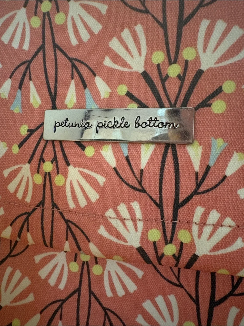 Petunia Pickle Bottom Coral Floral Baby Bag with Champagne Strap
